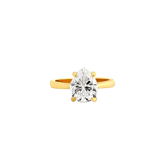 Four-Prong Pear Cut Ring – Classic Brilliance in a Delicate Silhouette