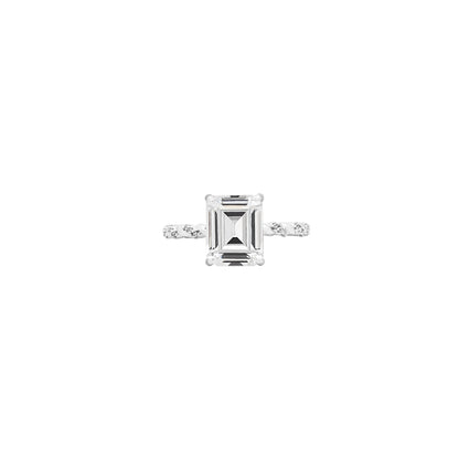 Twisted Band Emerald Cut Ring – Golden Weave Holding Timeless Clarity