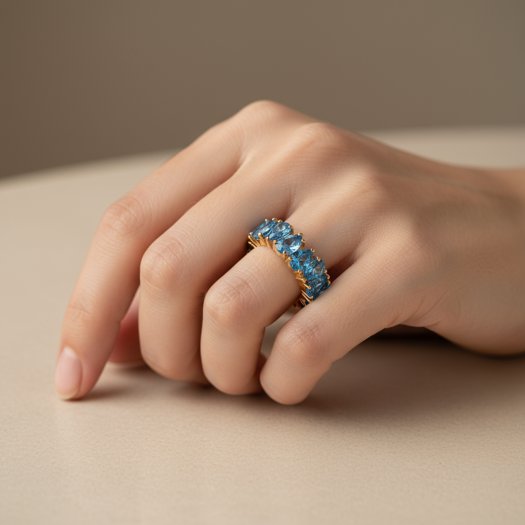 Pear Cut Blue Gem Eternity Ring – A Full Circle of Ocean Sparkle