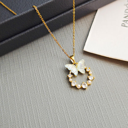 Butterfly & Pearl Circle Pendant – Graceful Sparkle for Your Neckline