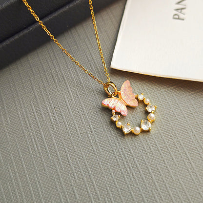 Butterfly & Pearl Circle Pendant – Graceful Sparkle for Your Neckline