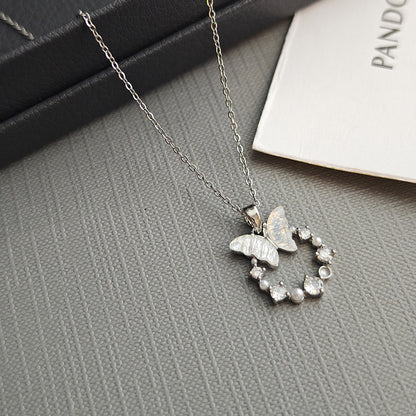 Butterfly & Pearl Circle Pendant – Graceful Sparkle for Your Neckline